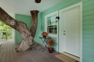 oak tree going through the SeaGlass Inn Bed and Breakfast
